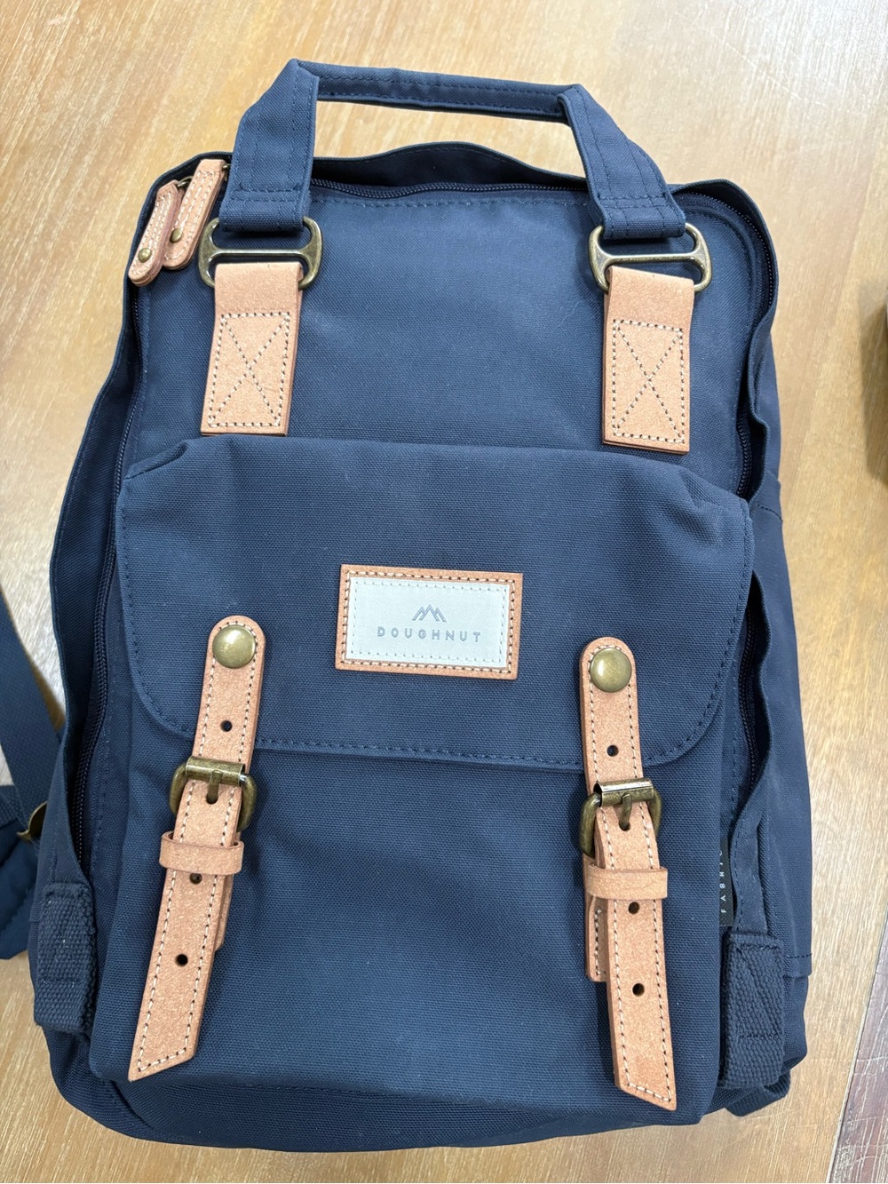 Doughnut Navy Canvas Backpack with Tan Accents